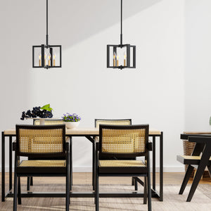2 Wismar 4 light candle style pendant lights above a dining room table.