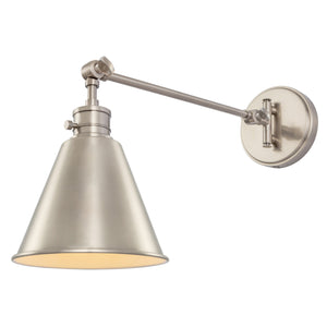 Moti swing arm wall sconce in polished nickel lit.